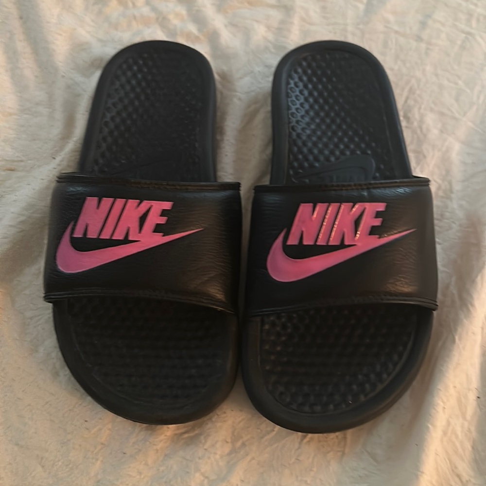 Nike slides black with pink size 7 smoke free pet free great condition